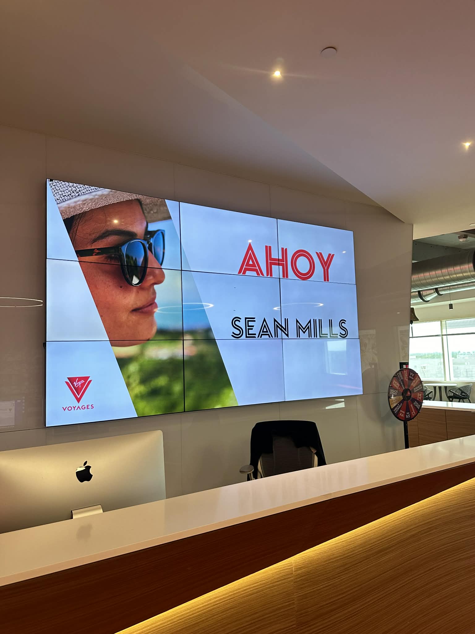 Ahoy Sean Mills welcome sign at Virgin Voyages headquarters